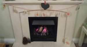 Not exactly a roaring fire, and a quite blatantly a picture taken at Christmas, but hubby refused to light another one just so I could take a picture-meanbag..!